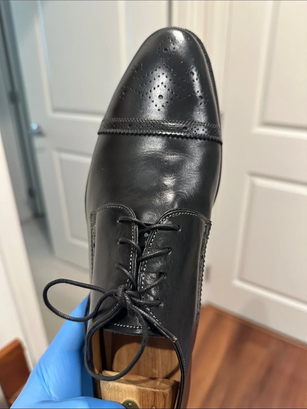 Santoni dress shoes feature a distinct toe medallion. - Picture 10 of 14